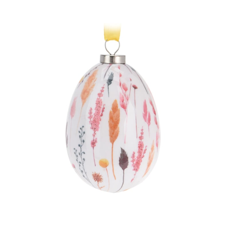 Paasdecoratie set van 4 paaseieren met grassen en bloemen in roze-, rood- en oranjetinten 10 cm hoog