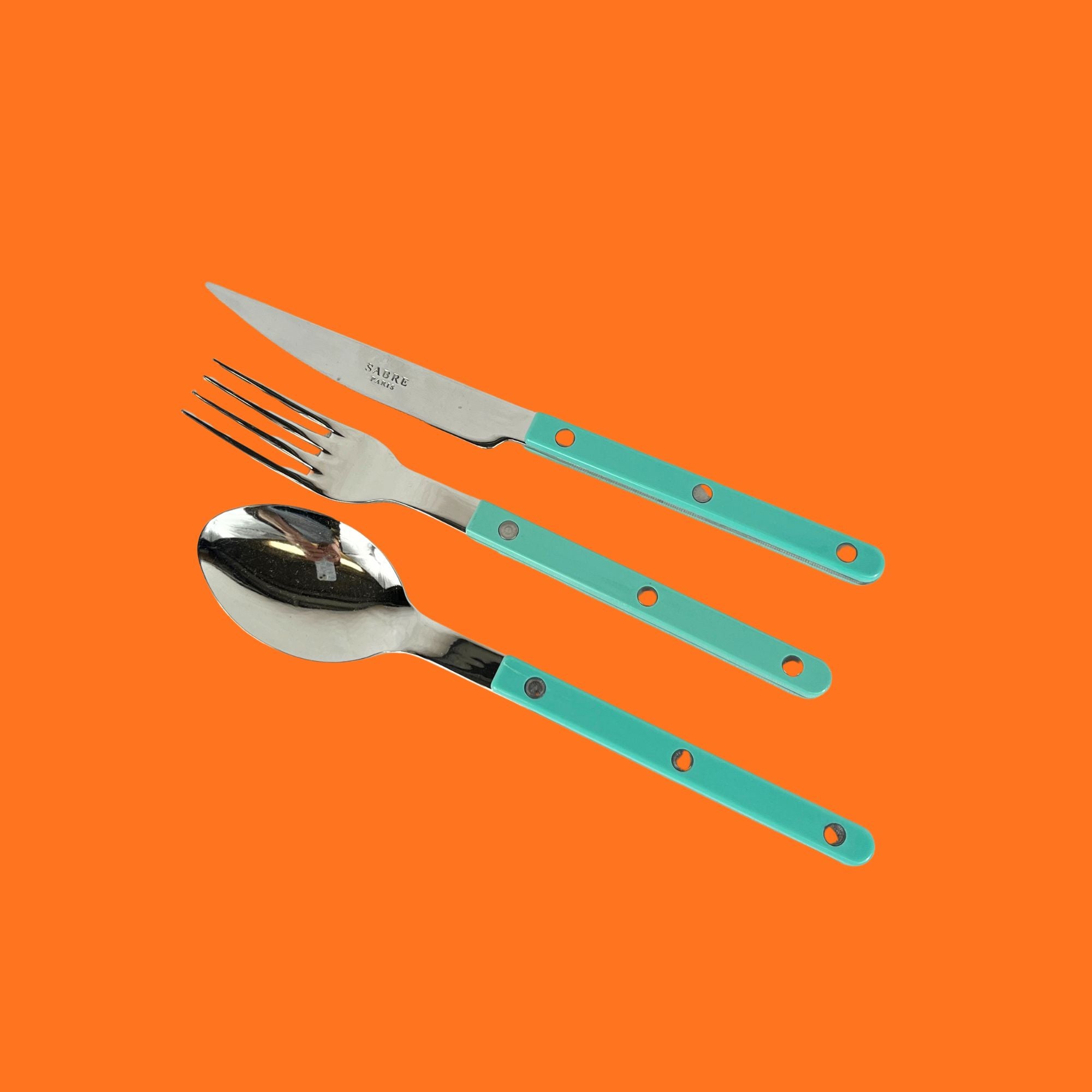 Sabre Bistrot 3-delige bestekset: dinermes, dinervork, dinerlepel (kies uit: felgeel, fuchsia, roze, turquoise)
