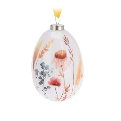 Paasdecoratie set van 4 paaseieren met grassen en bloemen in roze-, rood- en oranjetinten 10 cm hoog