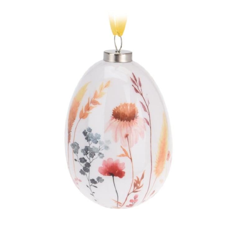 Paasdecoratie set van 4 paaseieren met grassen en bloemen in roze-, rood- en oranjetinten 10 cm hoog