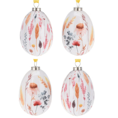 Paasdecoratie set van 4 paaseieren met grassen en bloemen in roze-, rood- en oranjetinten 10 cm hoog