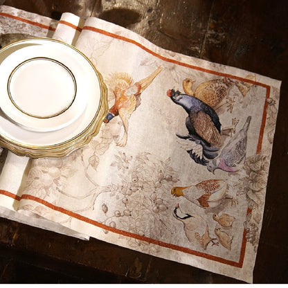 Tessitura Norma Linnen tafelloper en tafelkleden met reeën, korhoenders, hazen etc